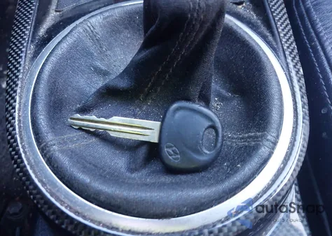 2003 Hyundai Tiburon z USA, uszkodzony, nr VIN KMHHM65D33U065455